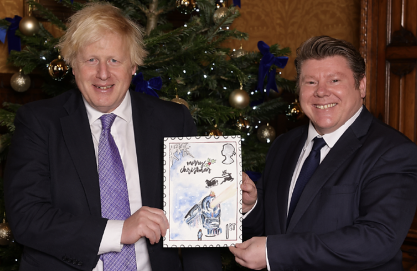 Boris Johnson and Dean Russell select winning Christmas card