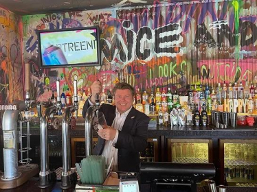 Dean Russell behind bar at Pryzm nightclub