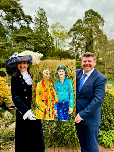 Dean Russell MP presents painting 